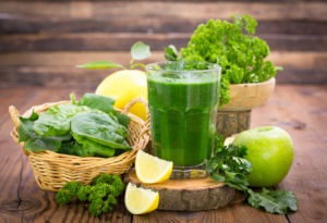 Fresh green smoothie in the glass - 