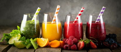 Selection of colorful smoothies in glasses - 